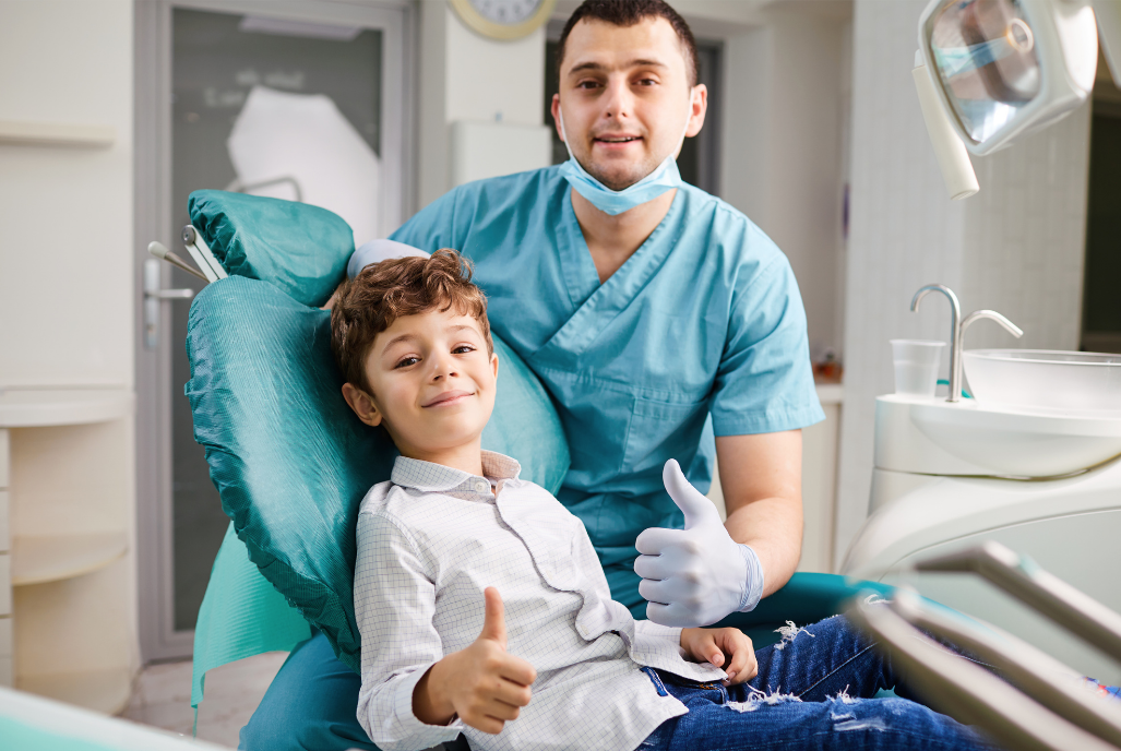 Dentist with a young patient